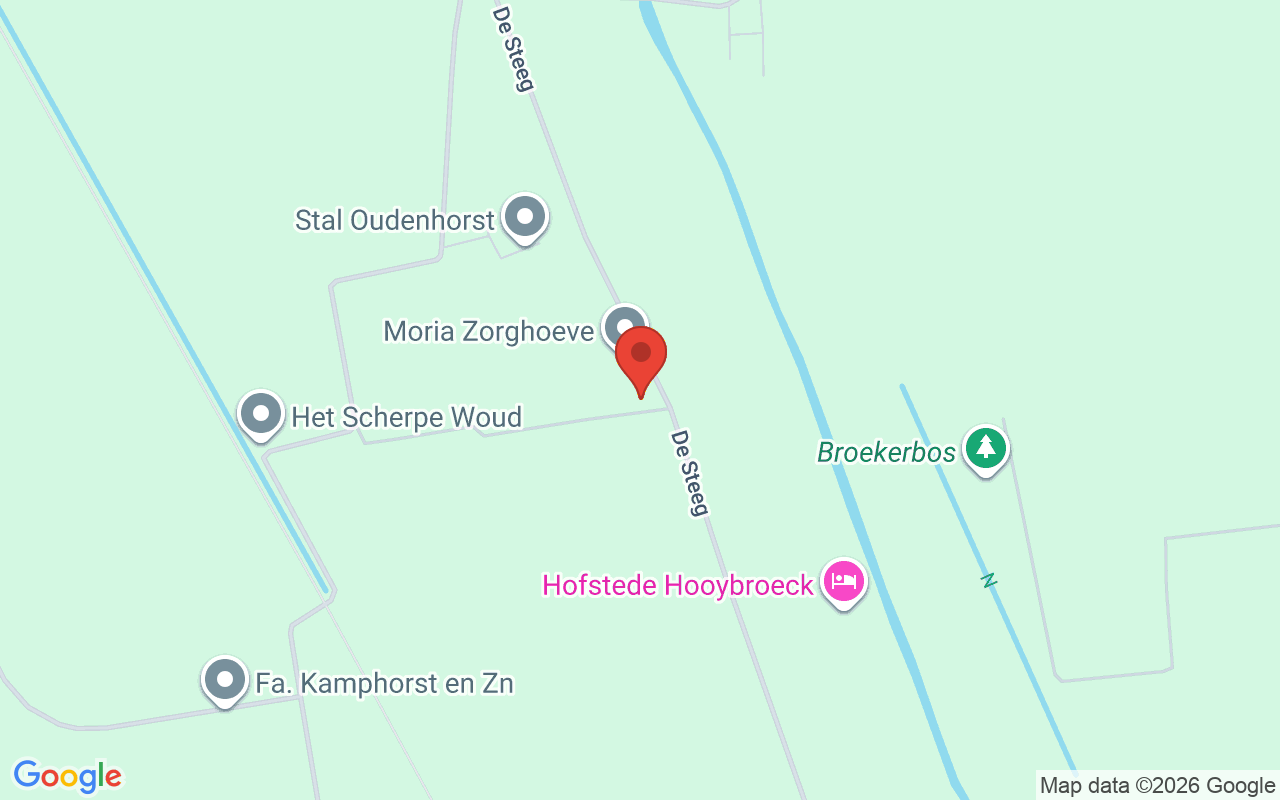 Gezicht op de Dorcas Winkel in Scherpenzeel met winkelpand en omgeving.