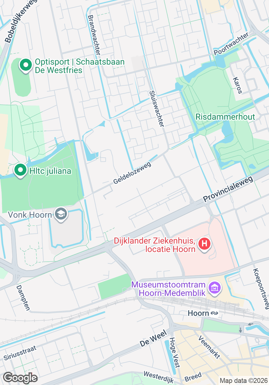 Gezicht op de Dorcas Winkel in Hoorn, met winkelpanden en straatbeeld.