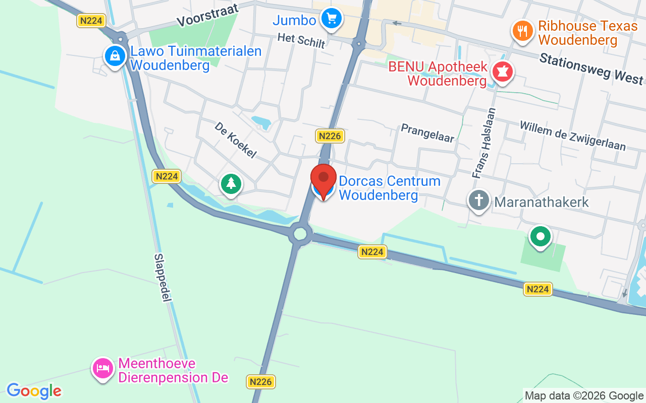 Gezicht op het Dorcas Regiocentrum in Woudenberg, gelegen nabij de N224 en N226 wegen, met omliggende wegen en voorzieningen in de omgeving.