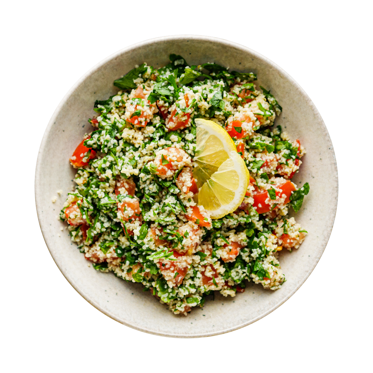 Gezonde Libanese salade met verse groenten, bulgur, citroen en peterselie, perfect voor humanitaire hulp en armoedebestrijding in Oost-Europa, Oost-Afrika en het Midden-Oosten.